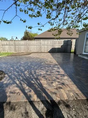 Lawn And Brick Specialist Logo