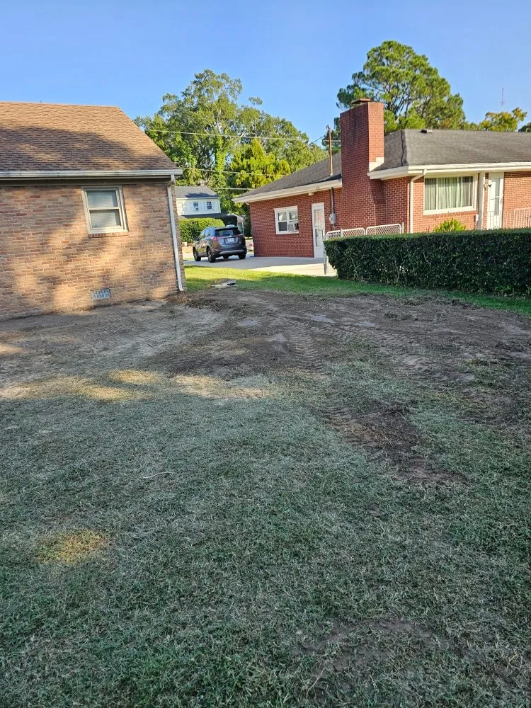 Professional outdoor landscaping with custom design in Hampton, VA by Lawn And Grounds Maintenance