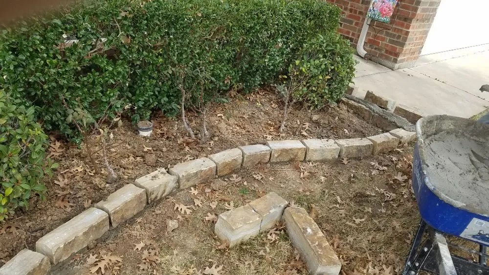 Affordable garden landscaping for year-round maintenance in Fort Worth, TX by Lawn Bandits