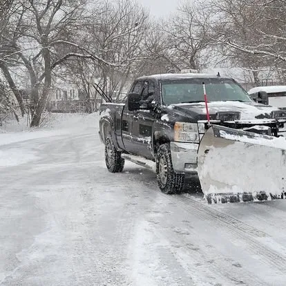 Professional yard maintenance for residential properties across Lansing, MI - Lawn Barbers of Lansing
