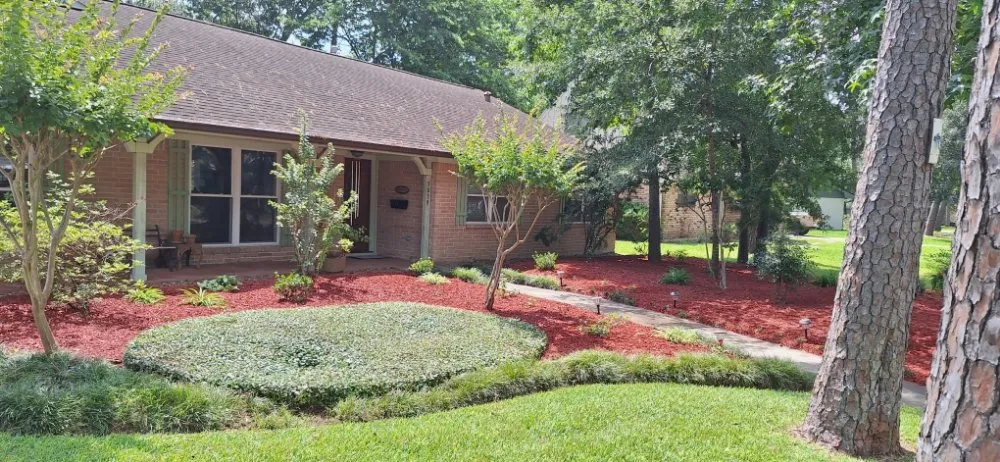 Professional outdoor landscaping for homes in Dickinson, TX by Lawn Boss