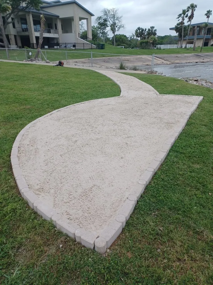 Affordable landscape design for homes in Dickinson, TX by Lawn Boss