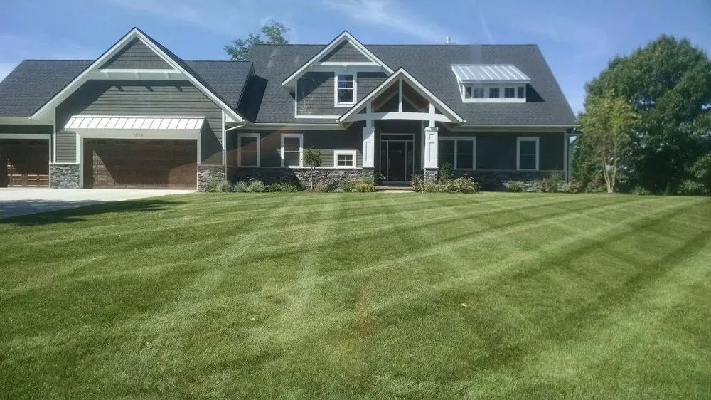 Professional landscaping services for homes in Caledonia, MI by Lawn Boys Outdoor Services