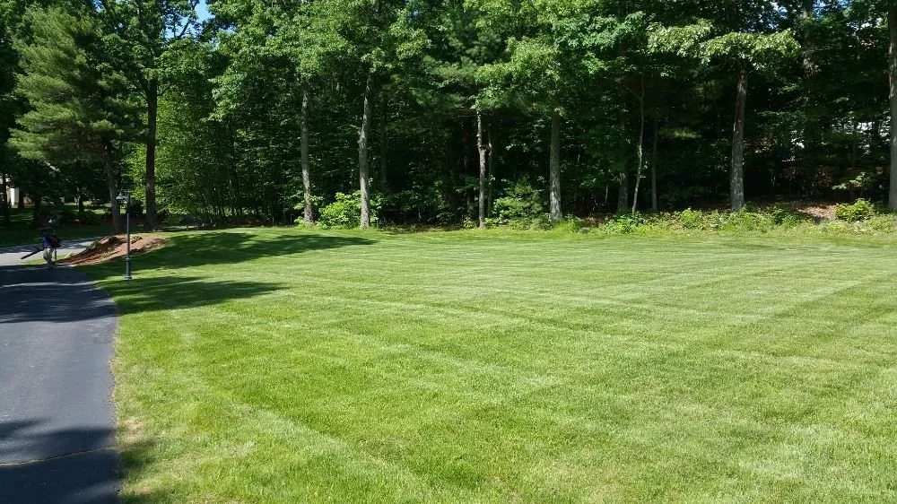 Top-rated landscape installation with custom design in Shrewsbury, MA by Lawn Boyz Landscaping