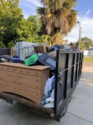 Lawn Care & Junk Removal Services Logo