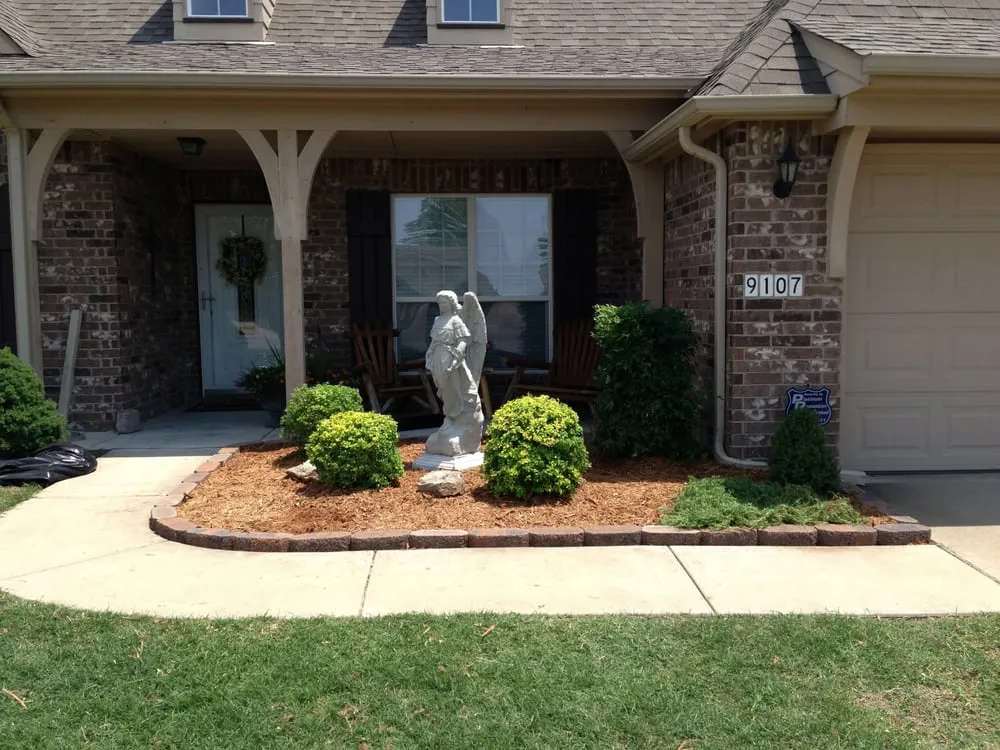 Custom landscaping services with custom design in Owasso, OK by Lawn Care and Beyond, Inc