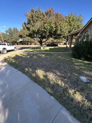 Lawn Care By Jonny Logo