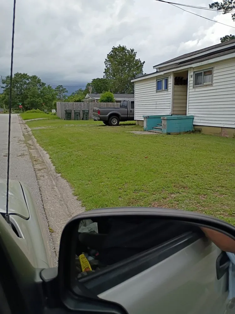 Local lawn mowing service with custom design in Waycross, GA by Lawn Care by Lawton