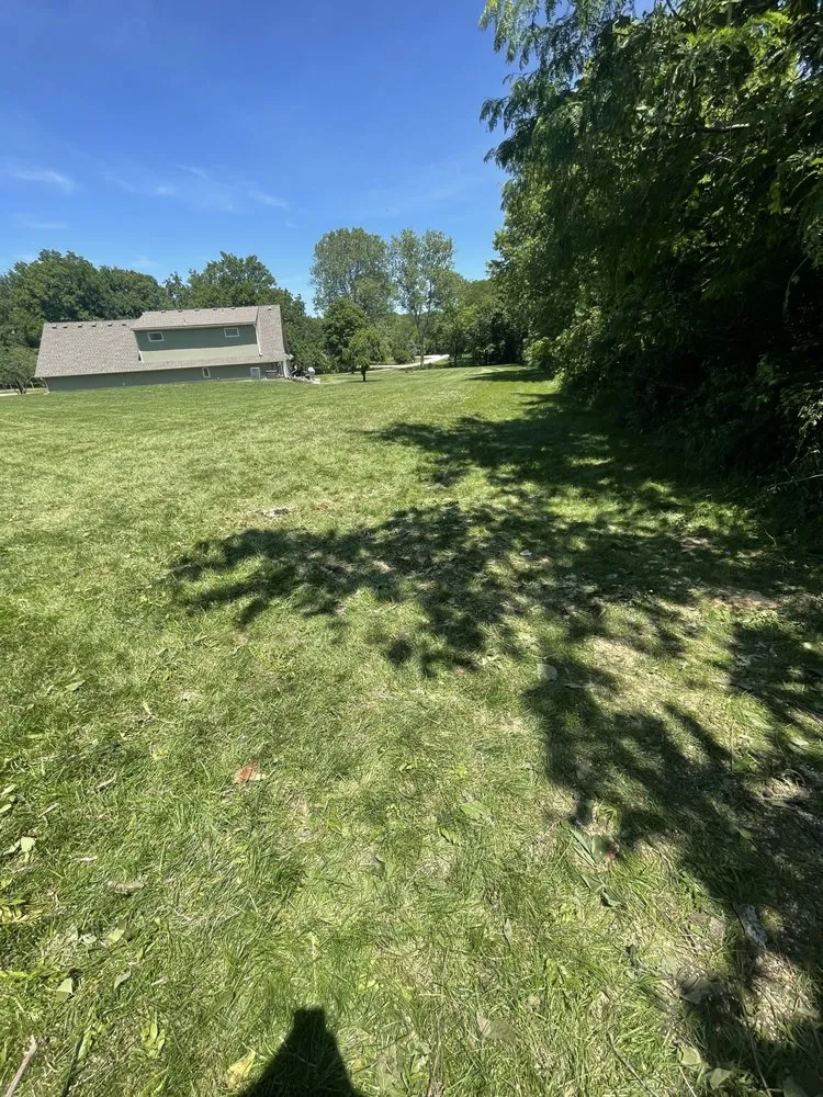 Custom residential landscaping in Belton, MO by Lawn Care John By John Myers