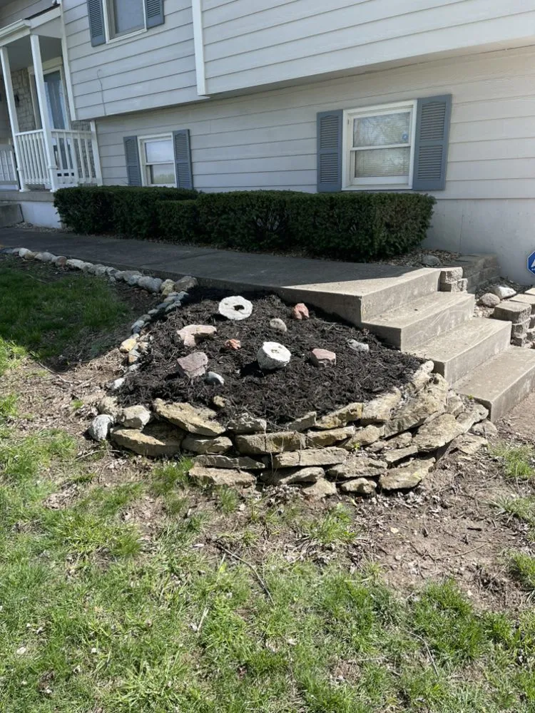 Custom landscape installation in Belton, MO - Lawn Care John By John Myers