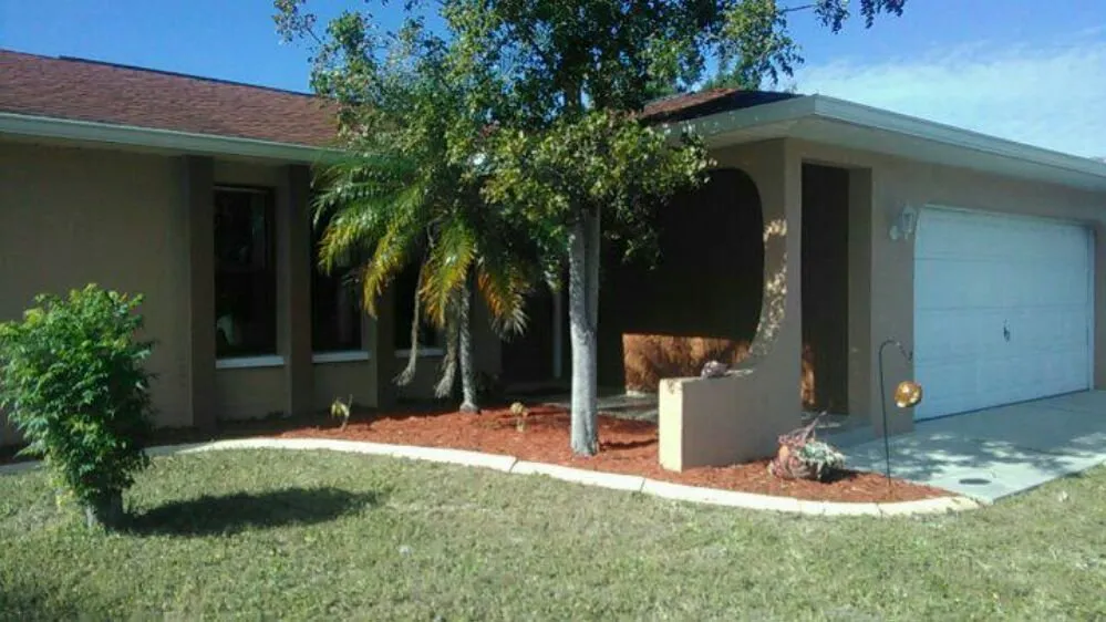 Top-rated garden landscaping with custom design in Cape Coral, FL by Lawn Care Service We Do It 4 You