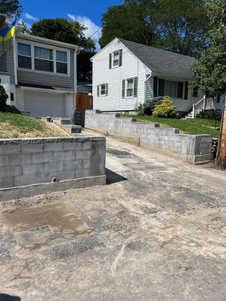 Affordable garden landscaping with custom design across North Syracuse, NY - Lawn Care Specialty