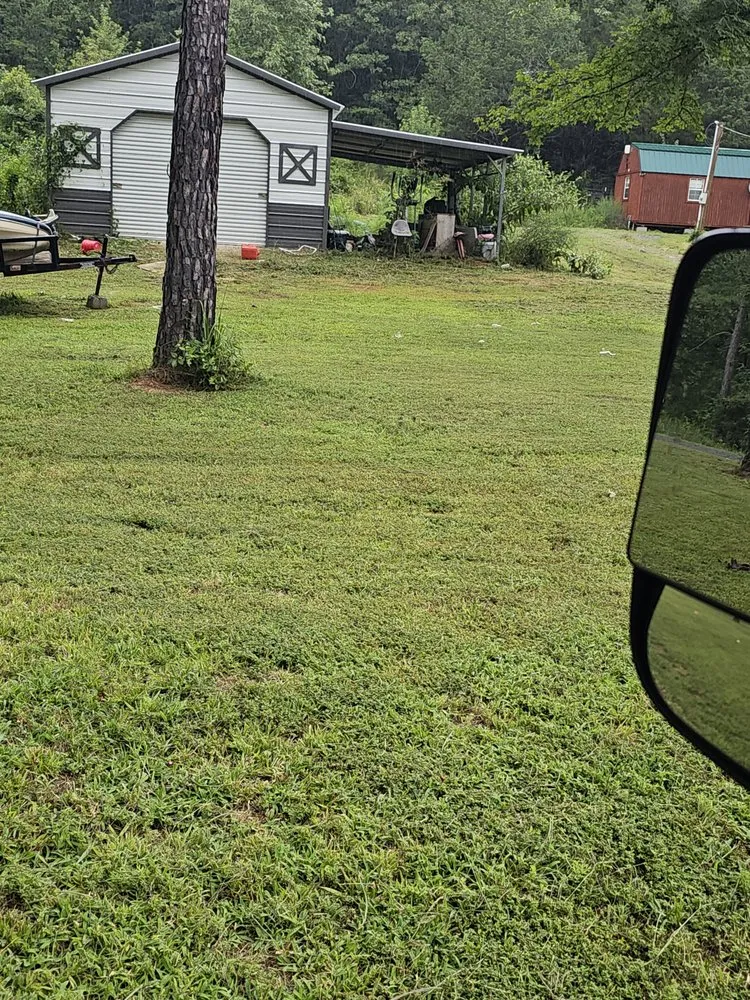 Affordable lawn mowing service for year-round maintenance across Quitman, AR - Lawn Champs