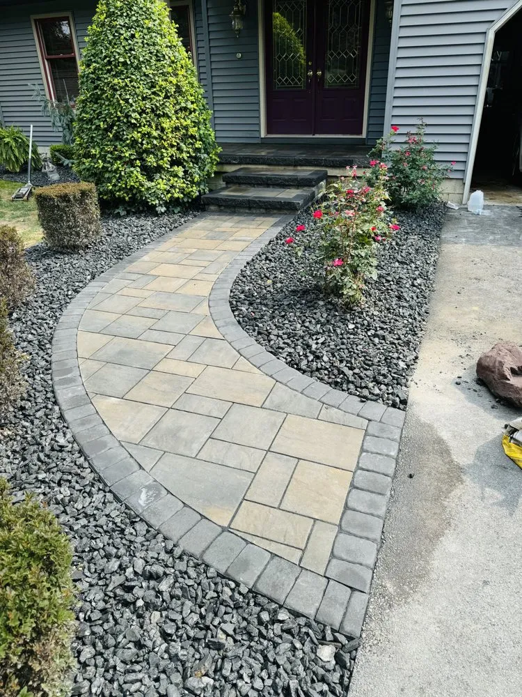 Expert landscaping services for year-round maintenance in Struthers, OH by Lawn commander