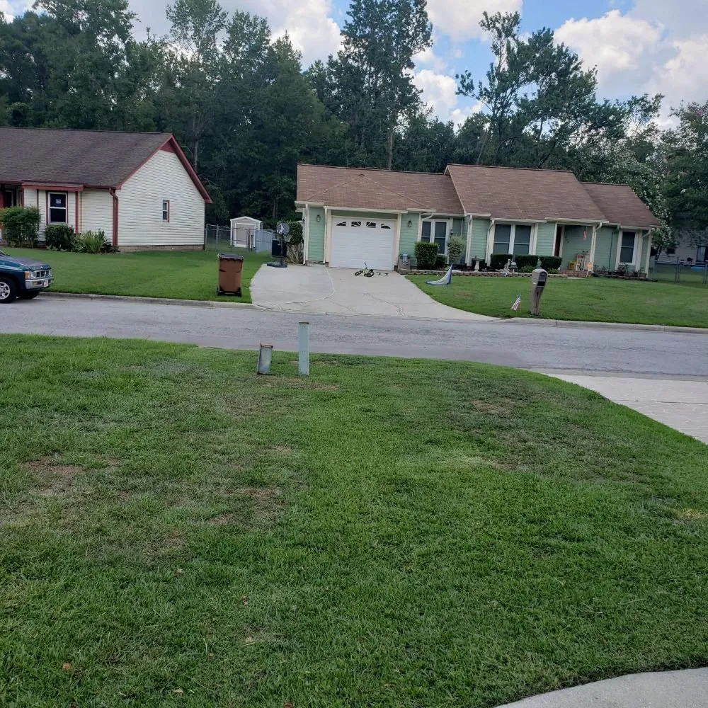 Custom lawn mowing service for residential properties in Jacksonville, NC by Lawn Dawg Lawn Care