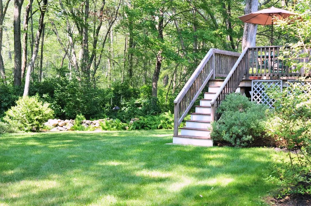 Custom garden landscaping in Raynham, MA by Lawn Dawg