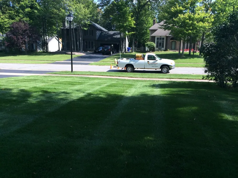 Custom lawn mowing service for year-round maintenance in Rochester, NY by Lawn Dawg