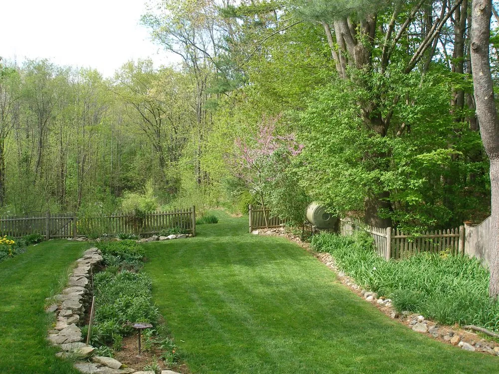 Professional landscape installation with custom design across Rochester, NY - Lawn Dawg