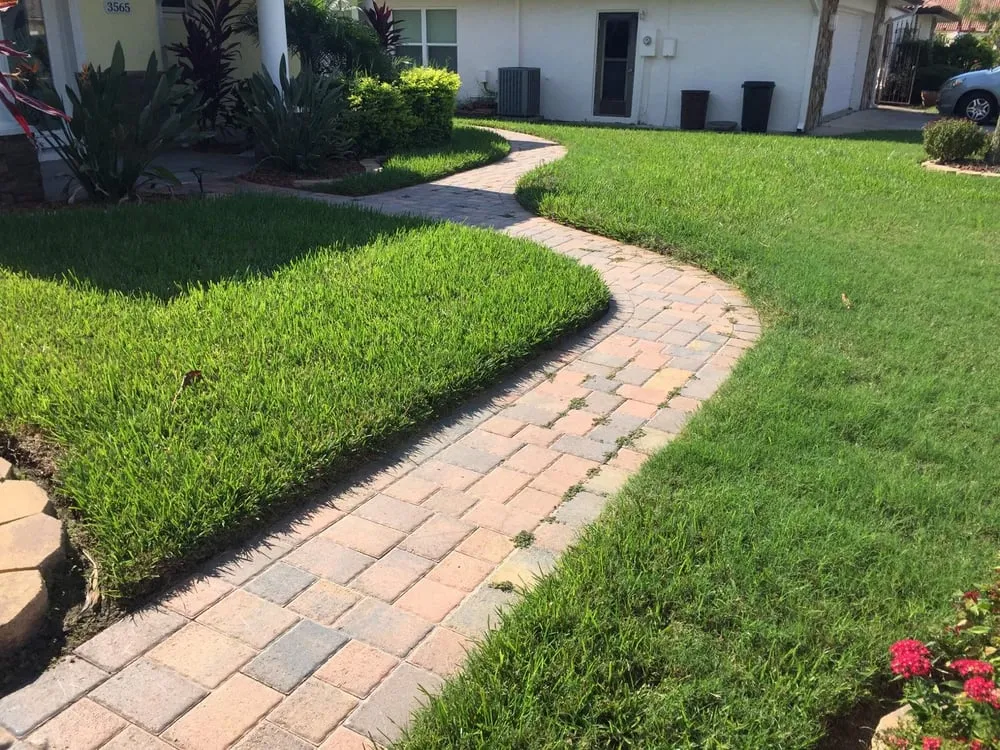 Local yard maintenance with custom design in Land O' Lakes, FL by Lawn Detectives