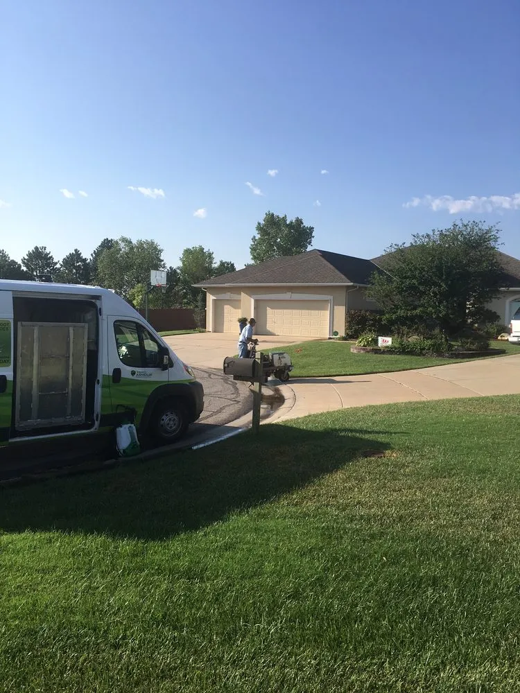 Custom lawn care service for year-round maintenance in Wichita, KS by Lawn Doctor
