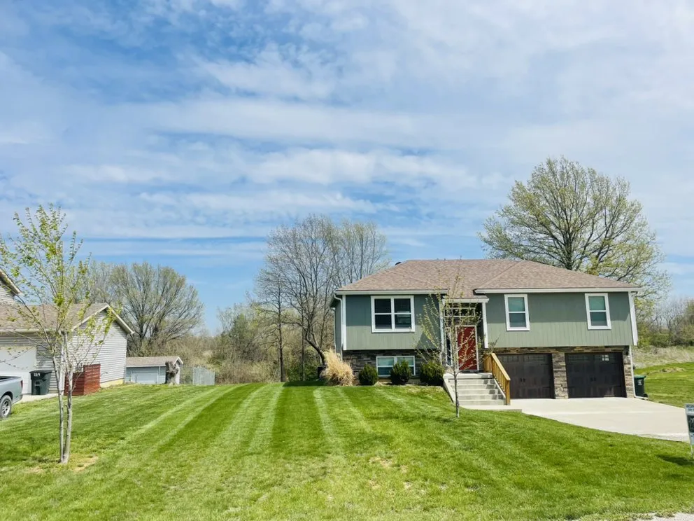 Trusted lawn mowing service for beautiful yards in Warrensburg, MO by Lawn Enforcement Burg