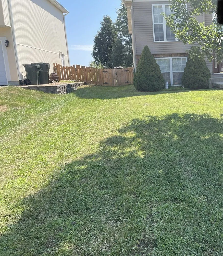 Custom landscaping services for residential properties in Warrensburg, MO by Lawn Enforcement Burg