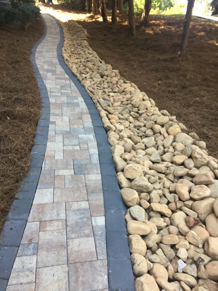 Professional outdoor landscaping for year-round maintenance in Snellvilleville, GA by Lawn Greeners