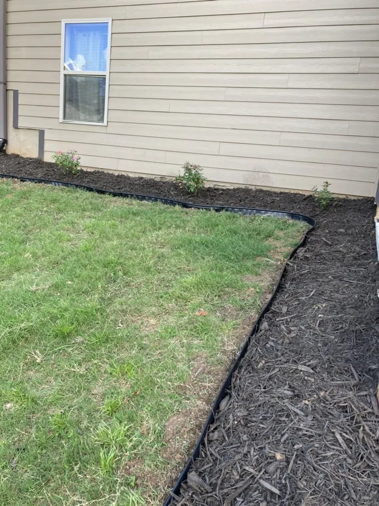 Custom landscape installation in Snellvilleville, GA by Lawn Greeners