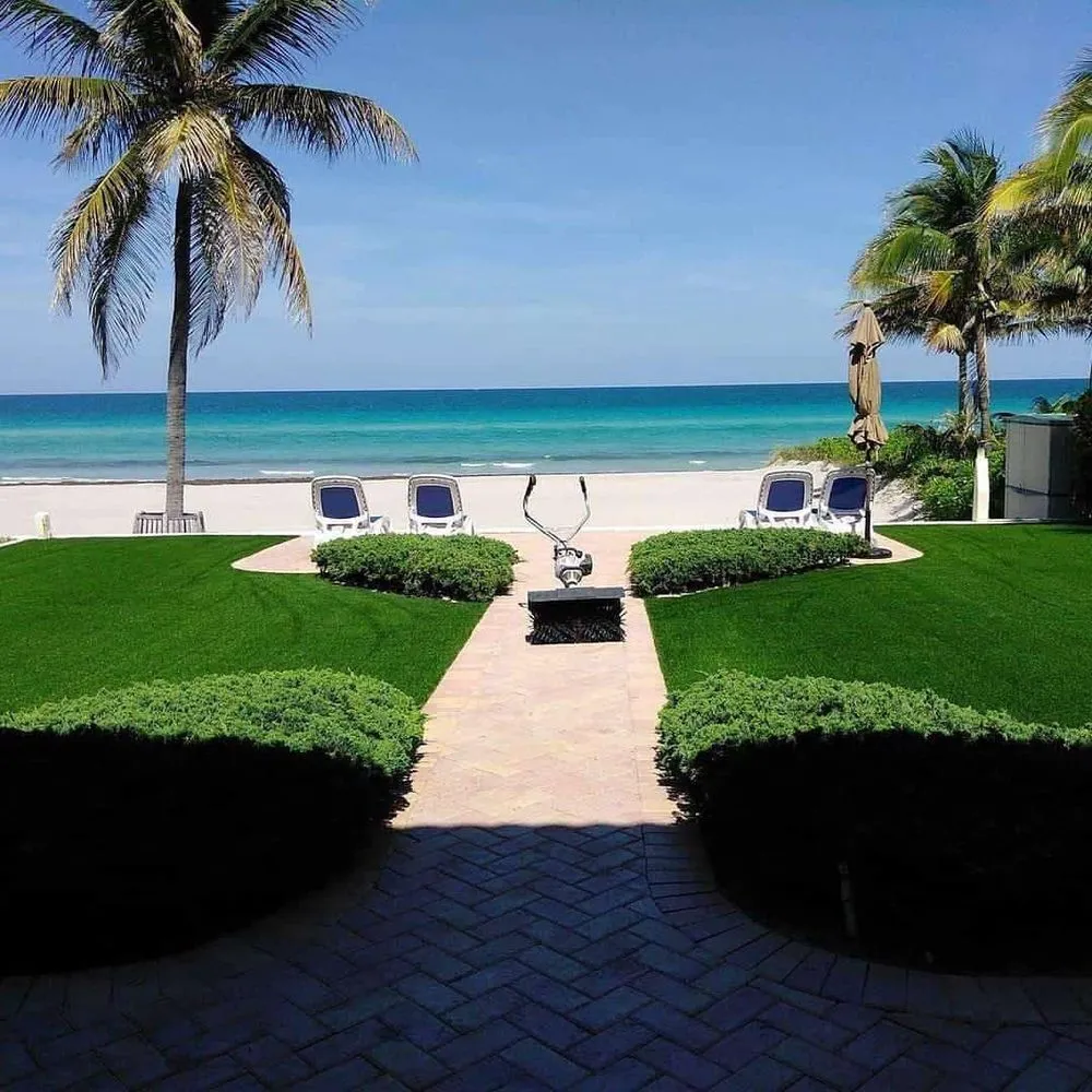 Custom landscaping services for year-round maintenance in Miami, FL by Lawn Guys Mia