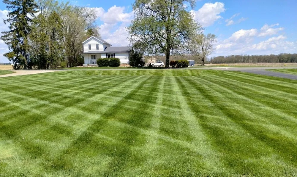 Reliable lawn mowing service with custom design in Owosso, MI by Lawn Guys