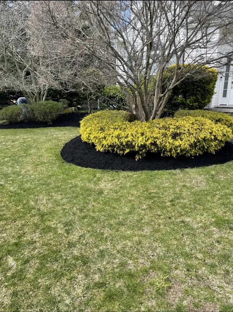 Custom landscape design for beautiful yards in Ronkonkoma, NY by Lawn Island Landcaping