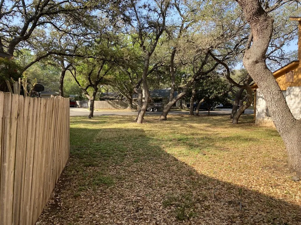 Custom outdoor landscaping with custom design in San Antonio, TX by Lawn Jockeys