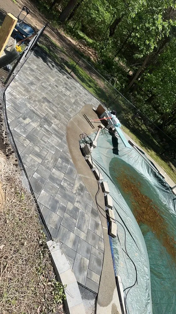 Local lawn mowing service for year-round maintenance in Waltham, MA by Lawn Jon Services