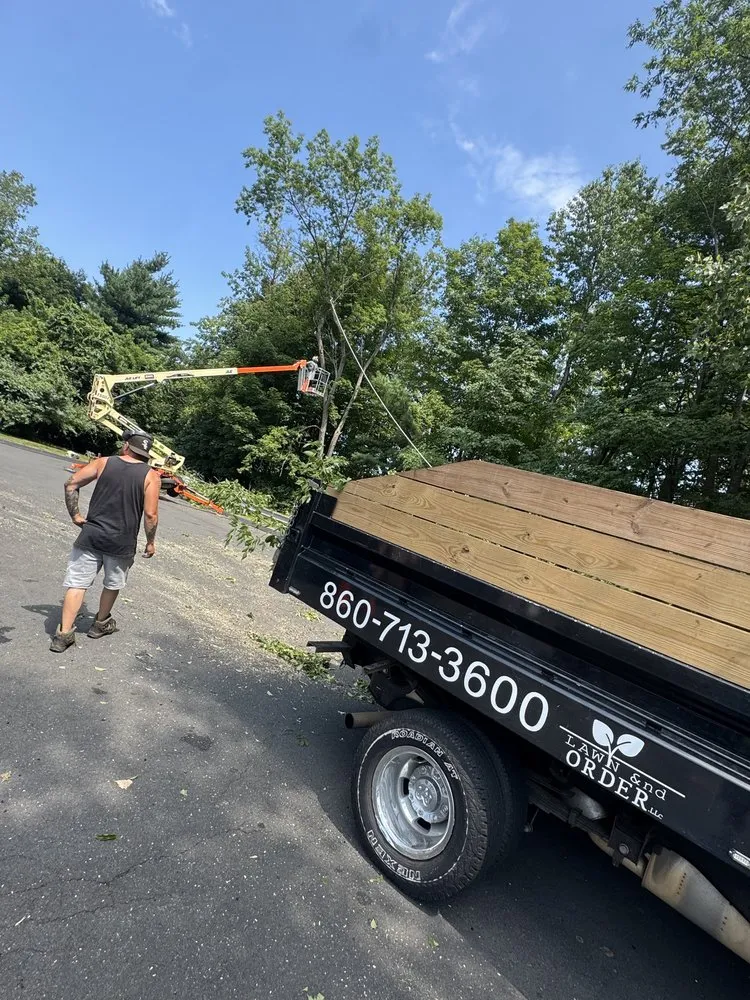 Professional garden landscaping for beautiful yards in New Britain, CT by Lawn &nd Order