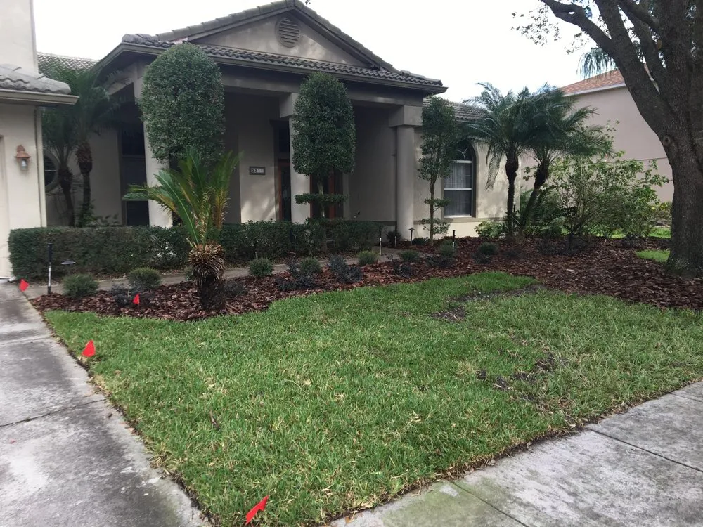 Custom garden landscaping for outdoor upgrades in Oviedo, FL by Lawn Patrol Landscaping