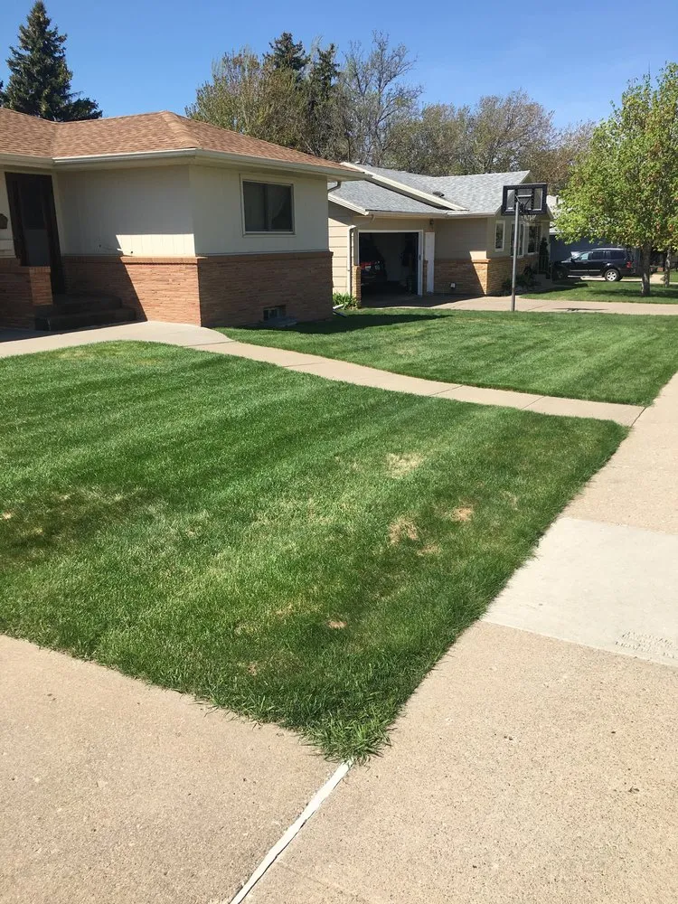 Reliable landscape design for year-round maintenance in Menoken, ND by Lawn Services by Heather