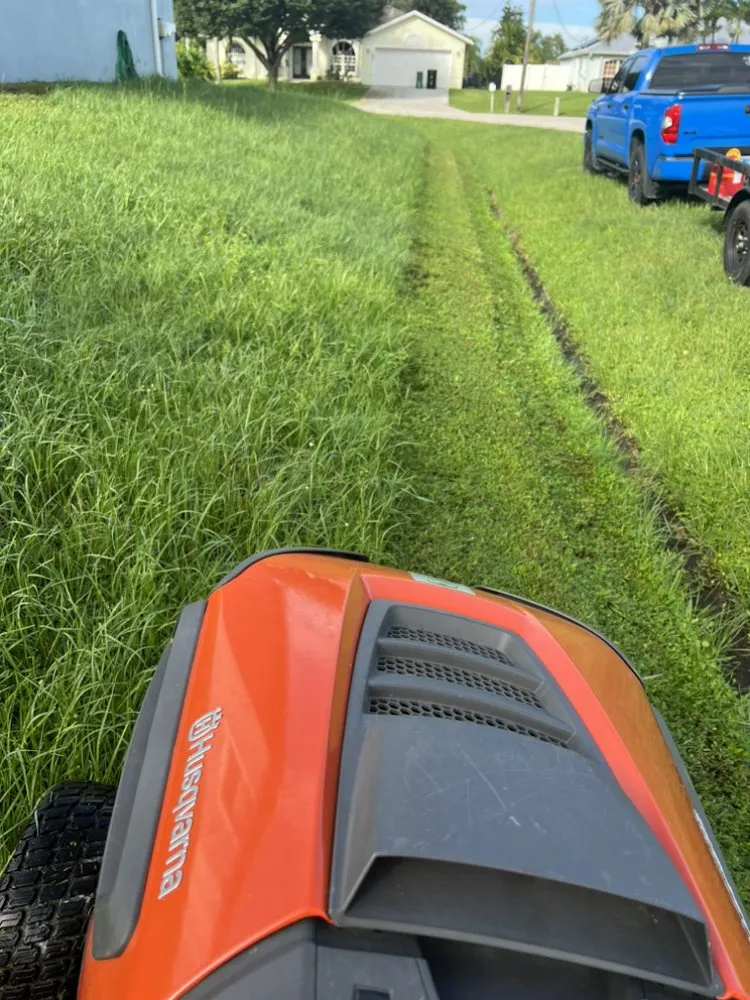 Affordable landscape installation for year-round maintenance in Port St. Lucie, FL by Lawn Sharks