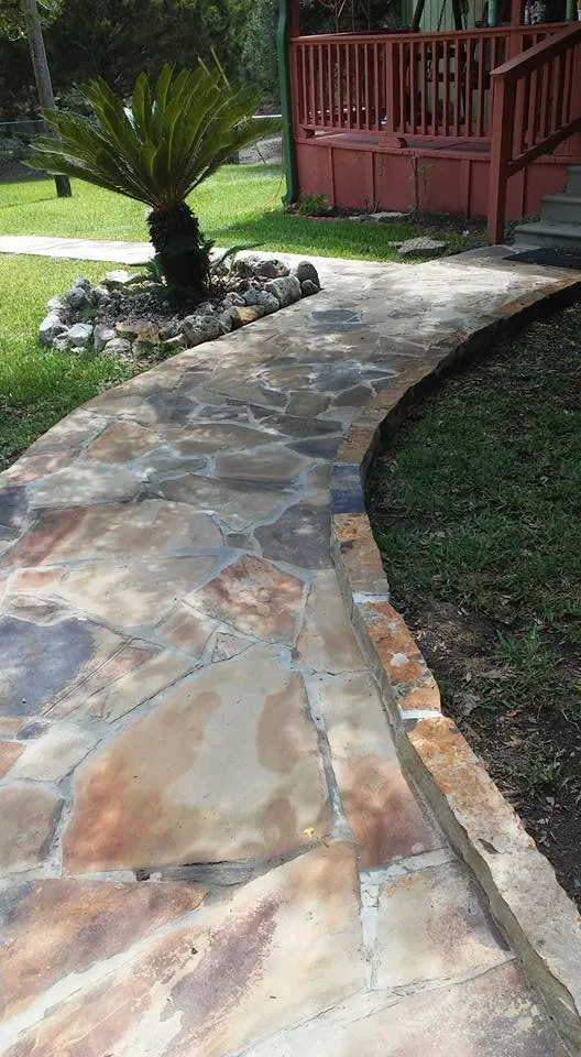 Professional outdoor landscaping in Onalaska, TX by Lawn Squad & Hurlin Wood