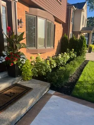 Lawnbusters Landscaping Logo