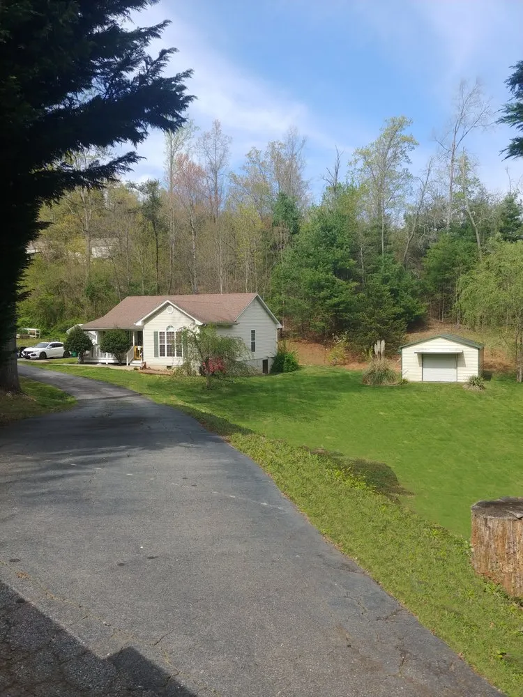 Affordable landscape installation with custom design in Candler, NC by LawnCo