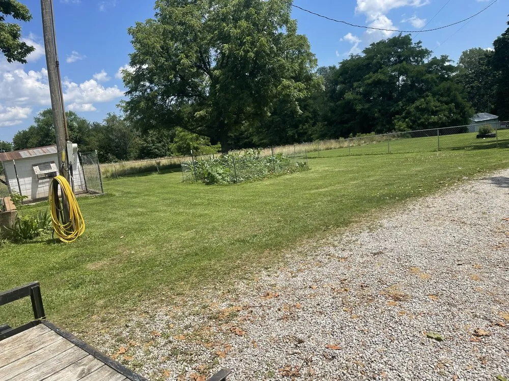 Custom residential landscaping for year-round maintenance in Lincoln, MO by Lawnlegends