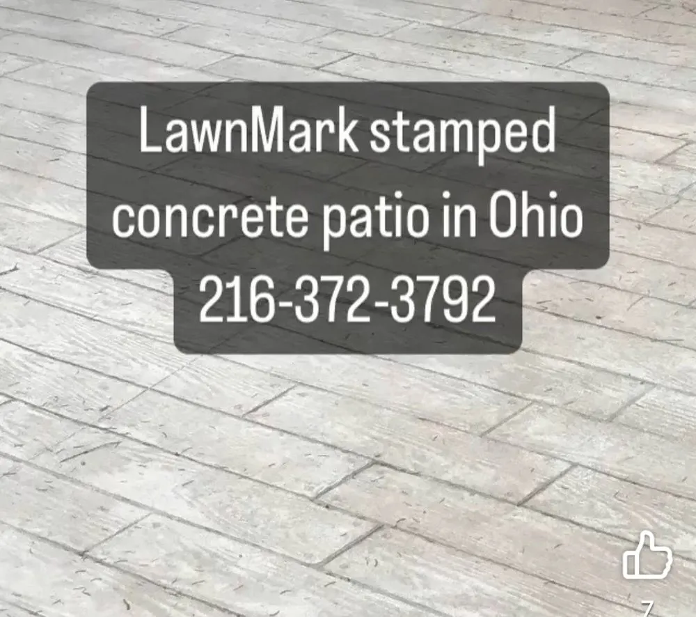 Professional landscape installation in Chesterland, OH by LawnMark Concrete Driveway and Patio