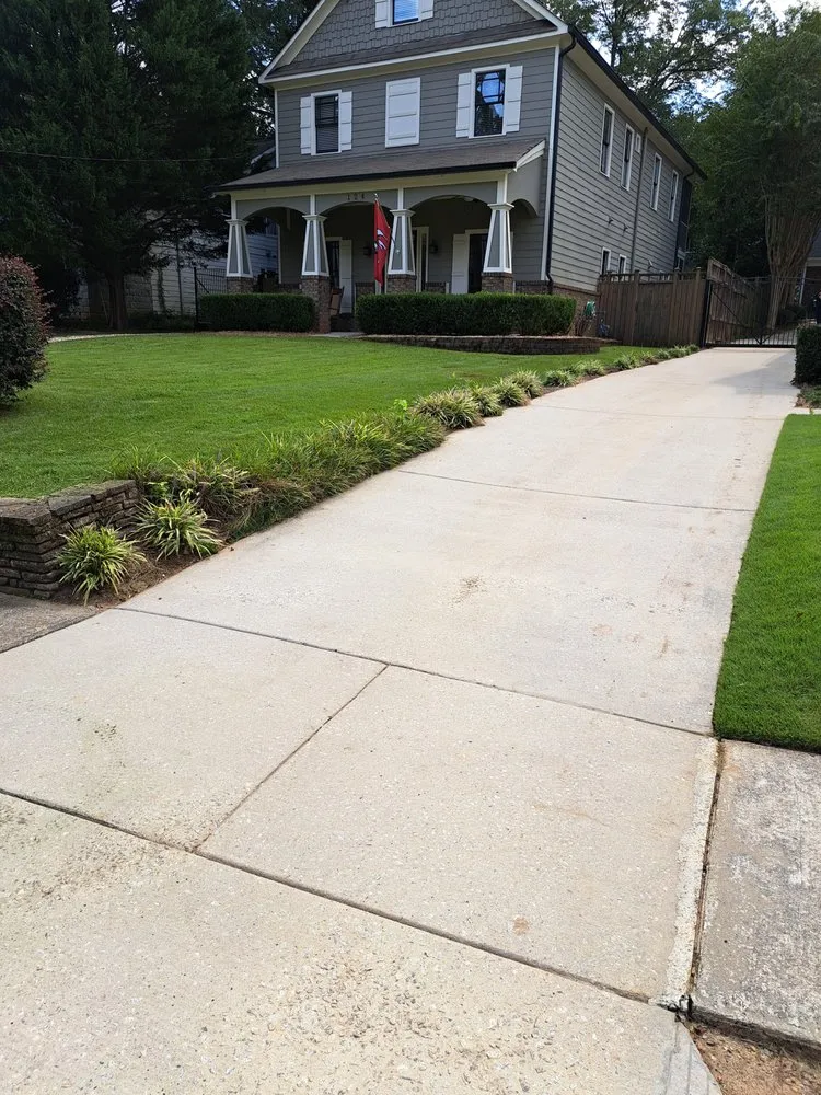 Local landscape design with custom design in Stone Mountain, GA by Lawnmasters