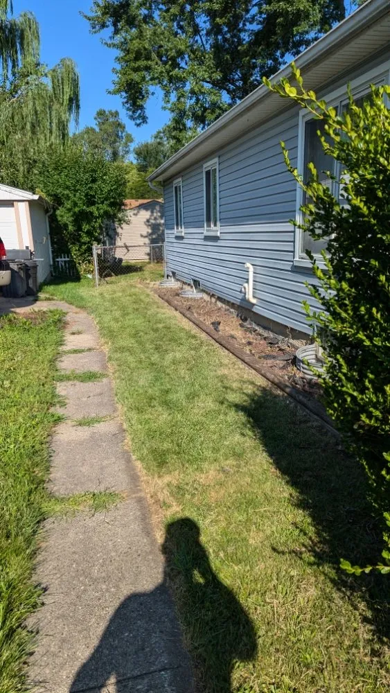Affordable lawn care service for outdoor upgrades in Redford, MI by Lawnology Lawn Service