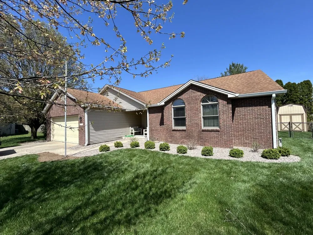 Custom landscape design for year-round maintenance in Columbus, IN by Lawns and Stripes Lawn Care