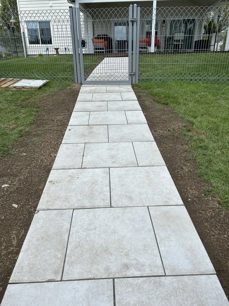 Affordable yard cleanup service for residential properties in Columbus, IN by Lawns and Stripes Lawn Care