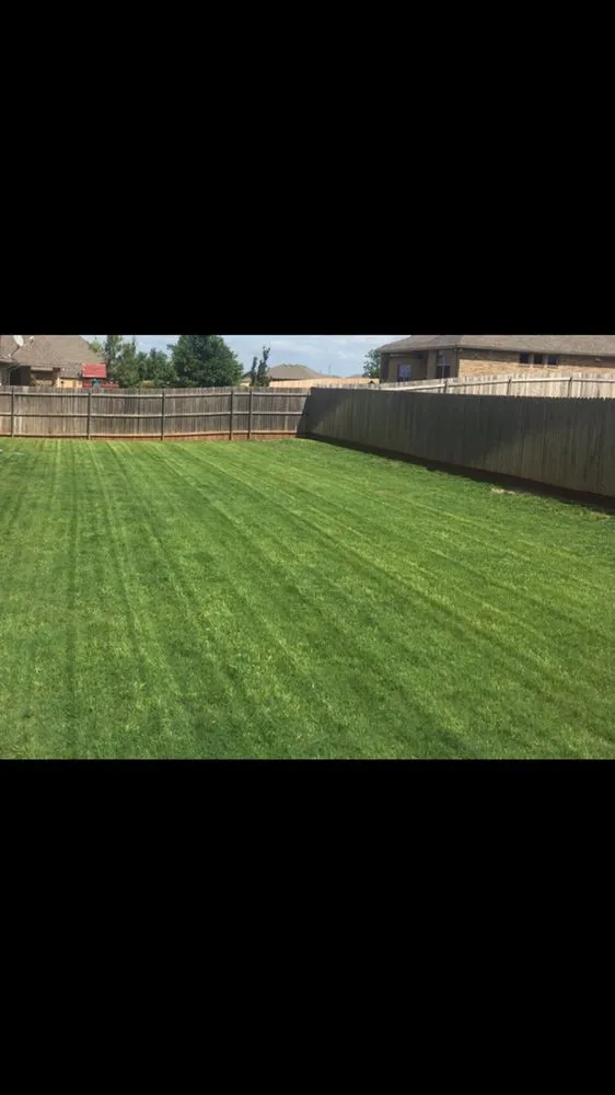 Professional yard maintenance in Yukon, OK by Lawns By Led