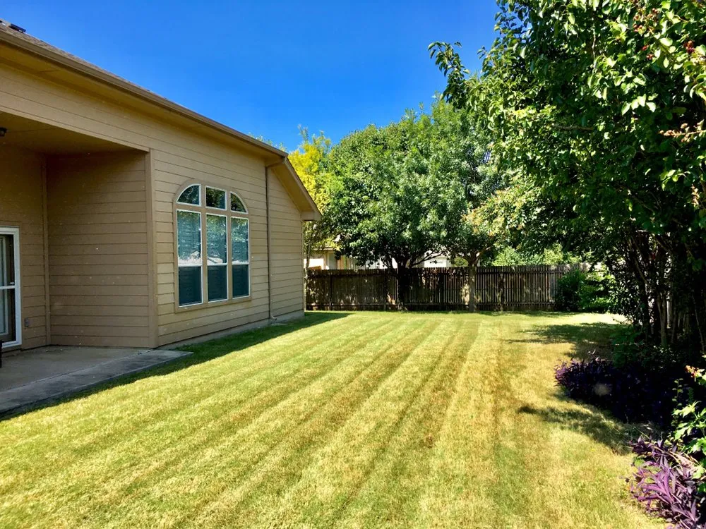 Local yard cleanup service for beautiful yards in Pflugerville, TX by Lawns-N-Order Lawn & Landscape Services