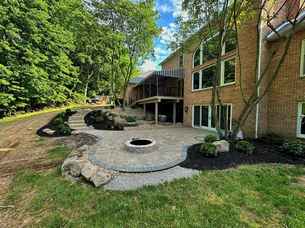 Professional yard cleanup service for year-round maintenance in Jackson Belden, OH by Lawns R Us Landscaping