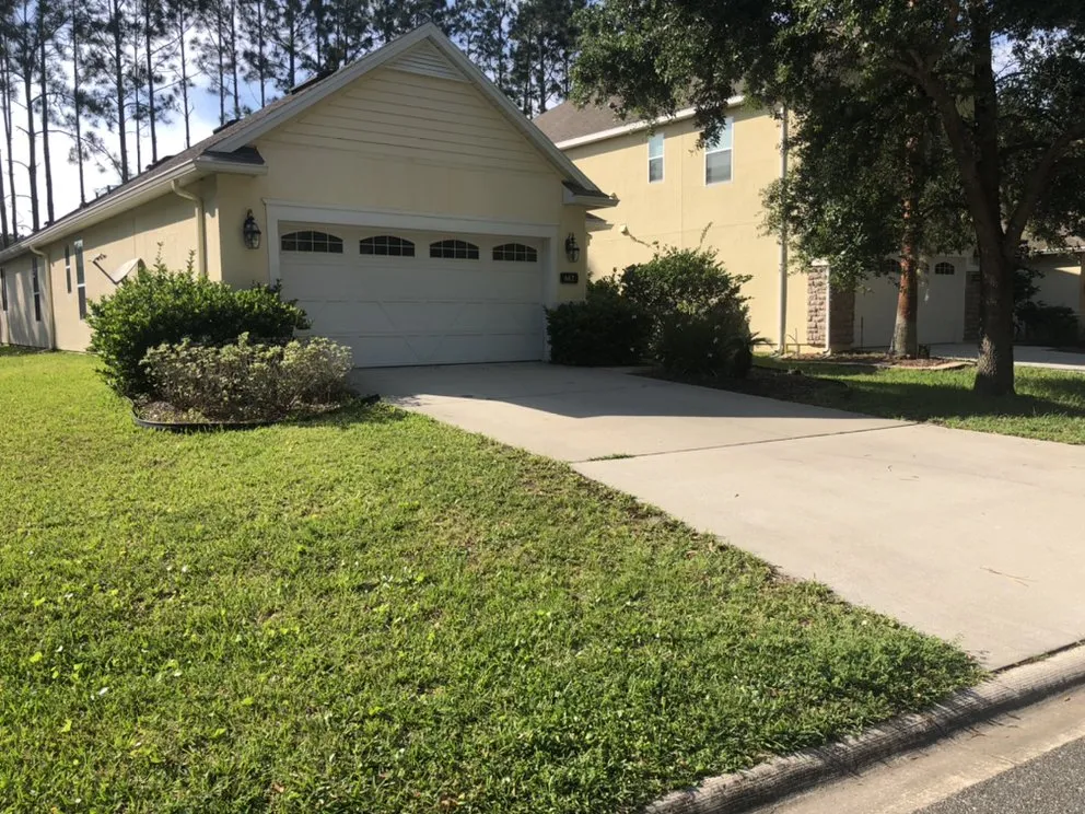 Custom outdoor landscaping for year-round maintenance in Middleburg, FL by Lawns Unlimited